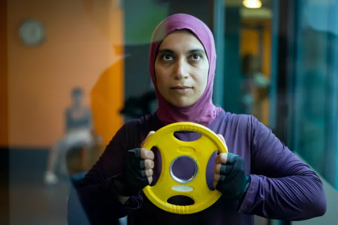 A woman working out in a gym