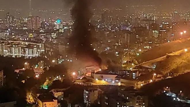 Smoke rising from Evin Prison