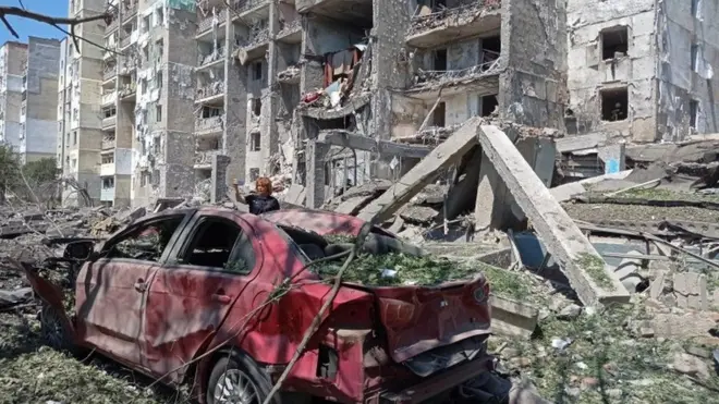 A damaged car in front of a destroyed building in Serhiyivka, Odesa region, Ukraine. Photo: 1 July 2022