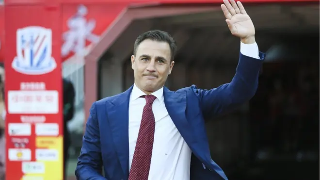 Head coach Fabio Cannavaro of Guangzhou Evergrande celebrates winning the 2019 Chinese Super League (CSL) title after the 30th round match between Guangzhou Evergrande and Shanghai Shenhua at Tianhe Sports Center on December 1, 2019 in Guangzhou,