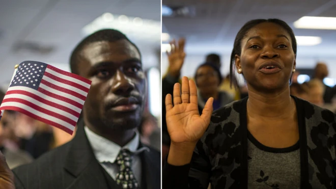 African immigrant - man and woman during citizenship ceremony for US