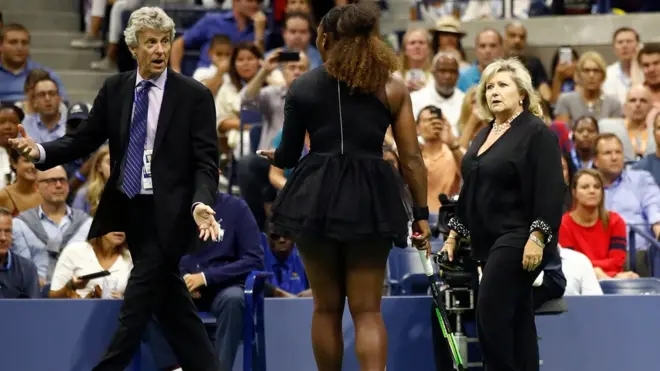 Serena Williams talking with grand slam supervisor Donna Kelso and referee Brian Earley during the US Open final
