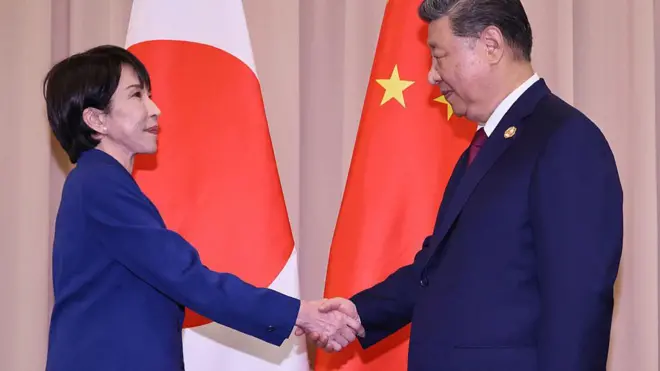 Санаэ Такаити и Си Цзиньпин