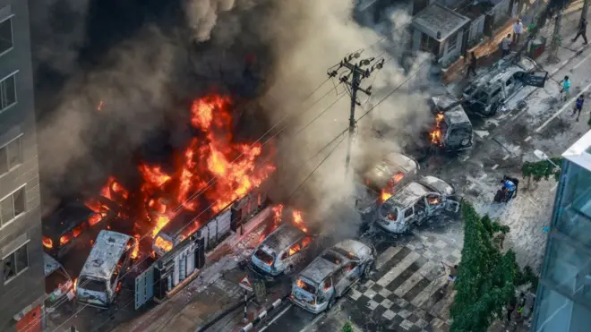 Several thousand protesters stormed and set a tv station on fire