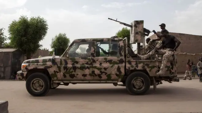 Nigeria Army soldiers dey patrol Banki for North-East Nigeria April 2017