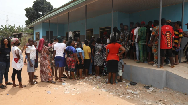 People standing for queue to vote on election day