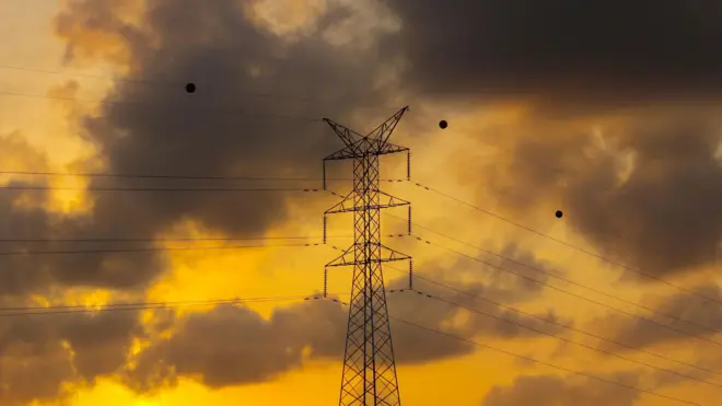 Picture of a electric tower in srilanka during sunset