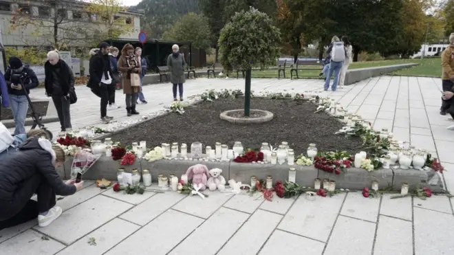 Residents have placed tributes for those killed in Kongsberg town centre