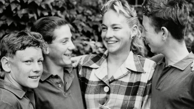 Wimbledon ball boys meet Darlene Hard, women's singles runner-up, at the 1957 Wimbledon Championship