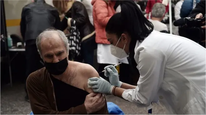 A patient receives a dose of vaccine against Covid-19, in Aristotelous Square, in the center of Thessaloniki