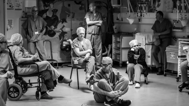 Medics sitting and standing together at Nevill Hall