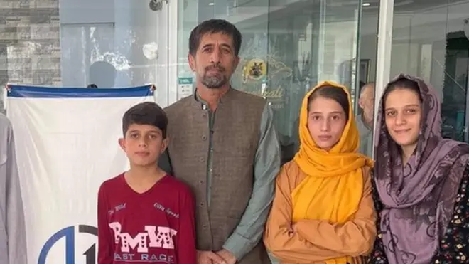 Mr Khalili (third from right) and his family