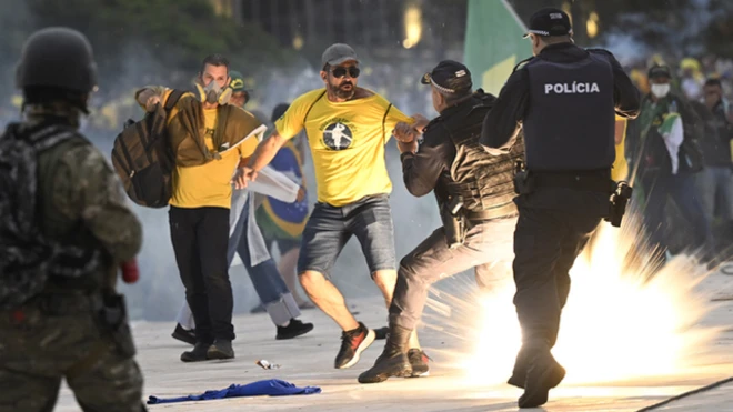 Protesters and police officers clash in Brazil