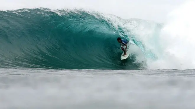 Surfer off the Philippines coast