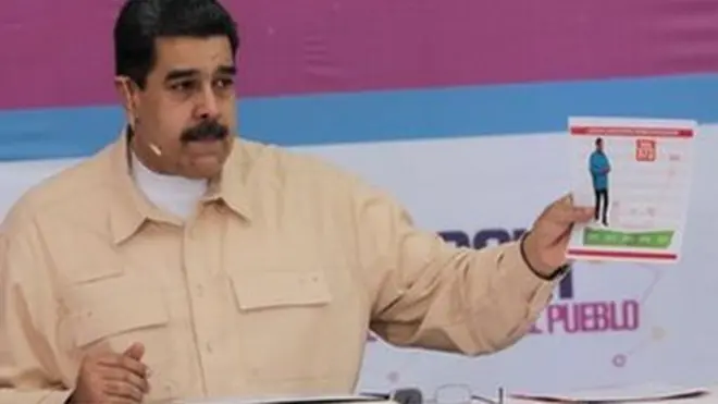 President Nicolas Maduro speaks during his weekly radio and TV broadcast Sundays with Maduro in Caracas, Venezuela, December 3, 2017