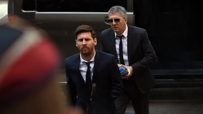Former Barcelona football star Lionel Messi and im father Jorge Horacio Messi bin arrive di courthouse on June 2, 2016 for Barcelona, wia Messi and im father bin dey face di judges for tax fraud case.