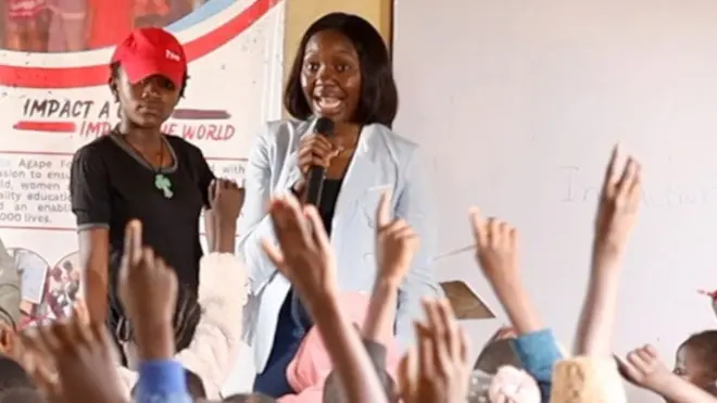 Prayer Nwagboso addressing children