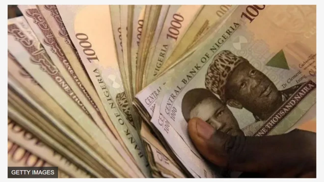 Aworan awọn ẹgbẹrun kan naira ti ọwọ kan ko dani