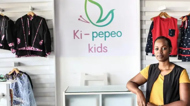 Priscilla Ruzibuka akiwa akinadi nguo za watoto chini ya nembo Ki-pepeo Kids
