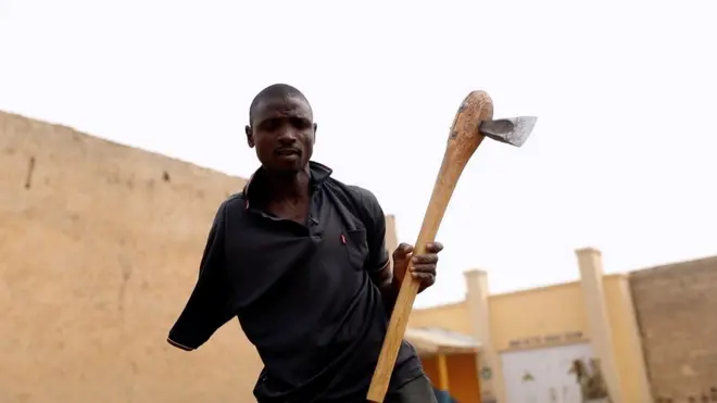 Kabiru with an ax