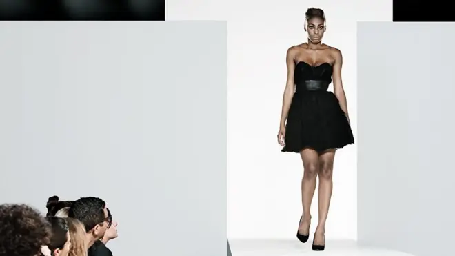 Model on catwalk at fashion show