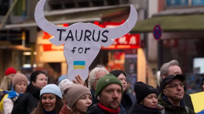 Germans call on their government to arm Ukraine with Taurus missiles during a march in Cologne