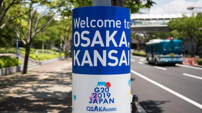 A sign for the G-20 Summit is displayed near the Intex Osaka, the venue for the summit on June 24, 2019 in Osaka, Japan.