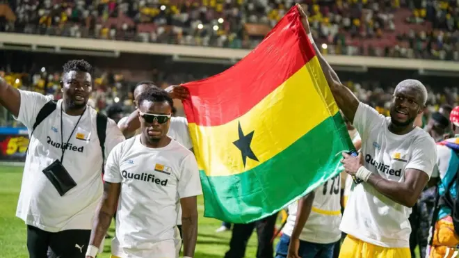 players celebrate qualification