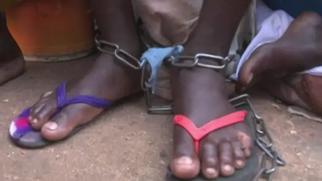 Shackled feet