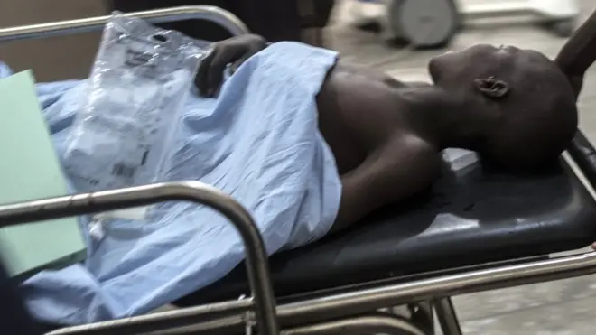 Sick person wey dey stretcher