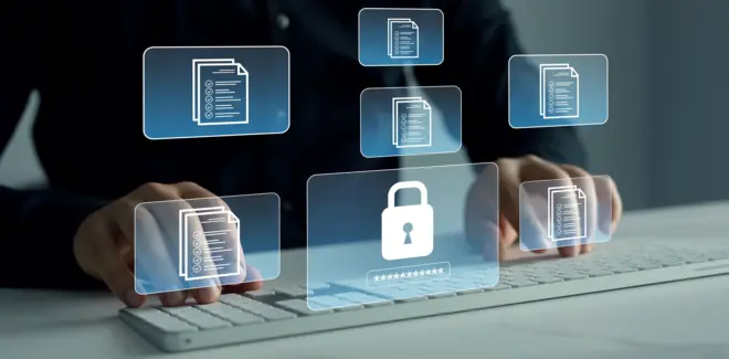 На заднем фоне человек в темной одежде сидит за стол, положив руки на белую клавиатуру. Над клавиатурой голограмы значков-файлов и замка с паролем.