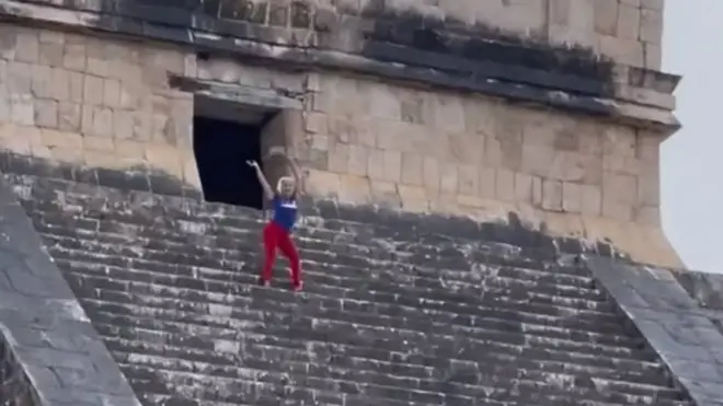 A tourist was heavily condemned for illegally climbing to the top and dancing on a Mexican pyramid - named as one of the new seven 'Wonders of the World'