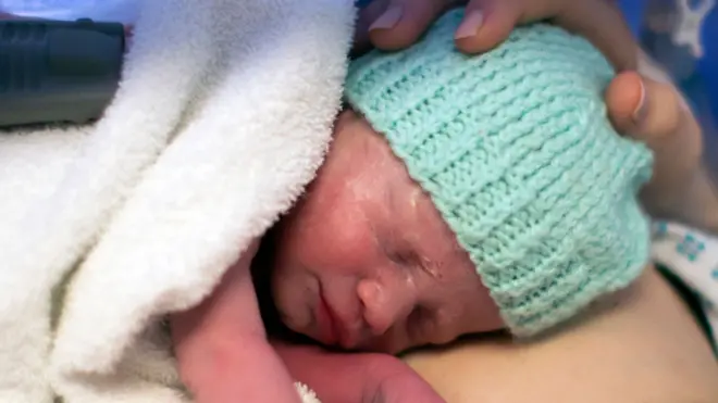 Baby Amy Isabel photographed soon after being born