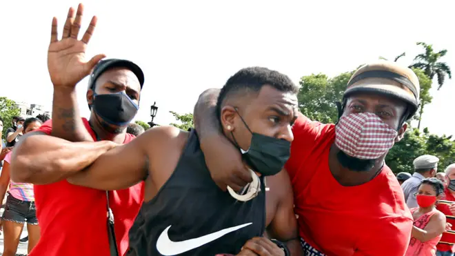 Arrest of an anti-government demonstrator in Havana, Cuba (11 July)