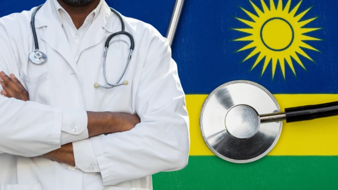 የሕክምና ባለሙያ [ከጀርባ የሩዋንዳ ባንዲራ]
