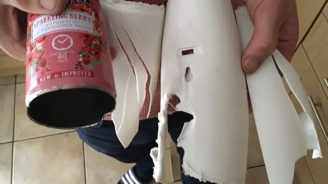 The destroyed remains of the automatic air freshener