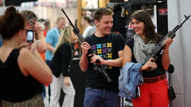 Asistentes a la convención de la NRA en Texas en 2013.