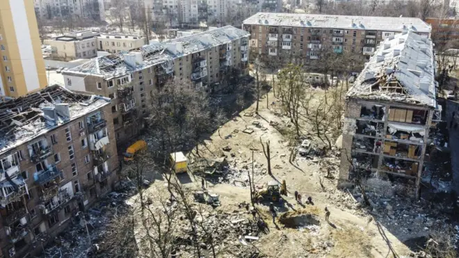 Many apartments and a school in the region are severely damaged, while the windows of some houses in the vicinity are broken by the effect of an explosion and many vehicles become unusable, after an attack carried out by the Russian forces in Kyiv, Ukraine on March 18, 2022