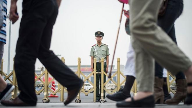 A Chinese paramilitary guard stands in Tiananmen Square in Beijing on June 3, 2016