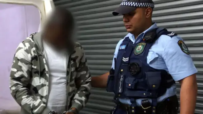 Di pesin wey dem say na ring leader wen New South Wales Police hold am