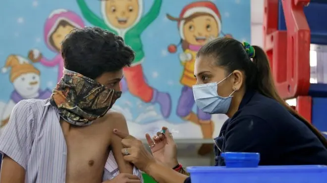 คนฉีดวัคซีน