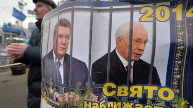 У грудні 2013 учасники протестів на Мадані незалежності у Києві вважали, що президент Янукович та прем'єр Азаров опиняться за ґратами вже у 2014