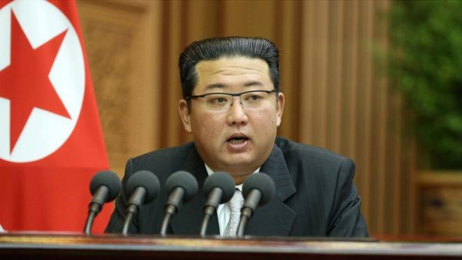 North Korean leader Kim Jong Un delivers a policy speech at the second-day sitting of the 5th Session of the 14th Supreme People"s Assembly