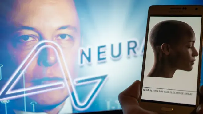 Neuralink logo displayed on mobil with founder Elon Musk seen on screen in the background. Neuralink Corporation is a neurotechnology company that develops implantable brain-computer interfaces. In Brussels on 4 December 2022.