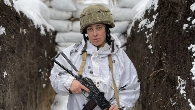 Maria is stationed on Ukraine's eastern front line. "We are standing our ground," she said