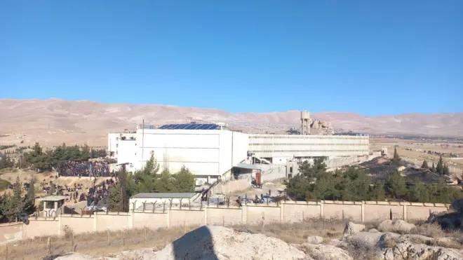 The Saydnaya Prison outside Damascus. The prison can be seen in the centre of the photo surrounded by high walls and guard towers.