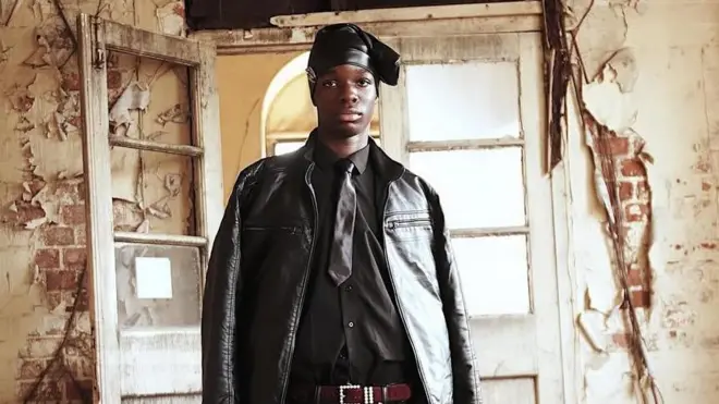 Picture of Tife for wetin resemble abandoned building for cover art shoot