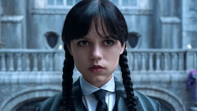 Jenna Ortega seen in Netflix's second season of Wednesday, wearing a Nevermore Academy uniform