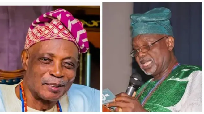 Olubadan Rashidi Ladoja lapa osi, Oloogbe Oloye Lekan Alabi lapa ọtun. Olubadan de fila pupa, o wọṣọ alawọ aro, o di de fila pupa o si lo ilekẹ sọrun rẹ,o n rẹrin-in musẹ. Oloogbe Lekan Alabi ni tiẹ n sọrọ si ẹrọ gbohungbohun, o de fila alawọ ewe si agbada funfun to ni awọn kan naa. O lo igo soju.