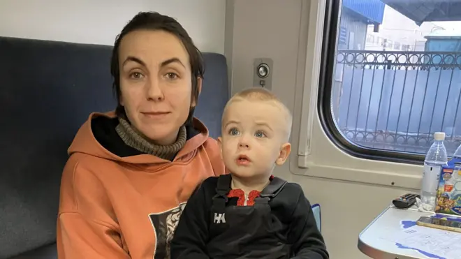 Mother and child on a train